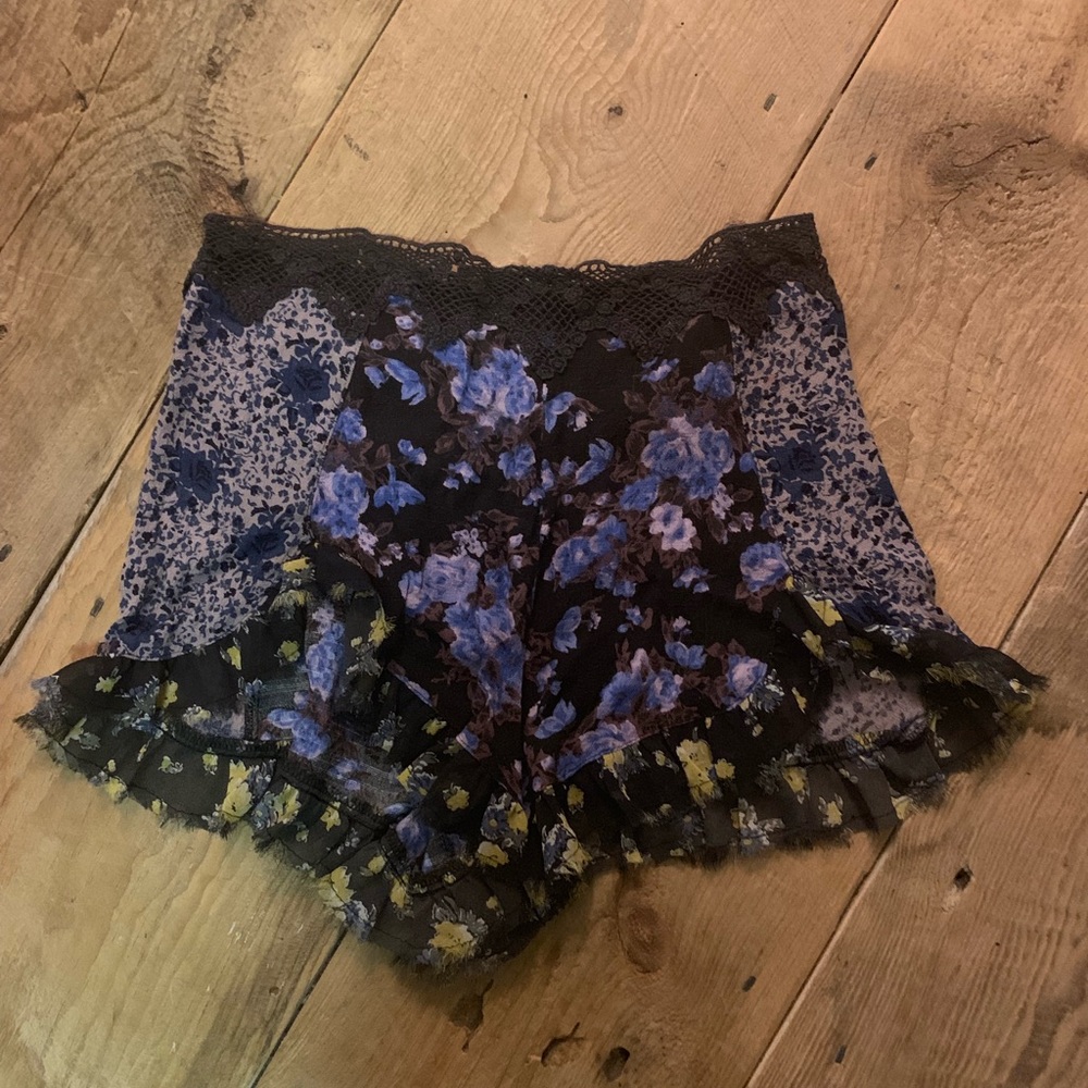 High waisted Free People shorts with ruffled hem